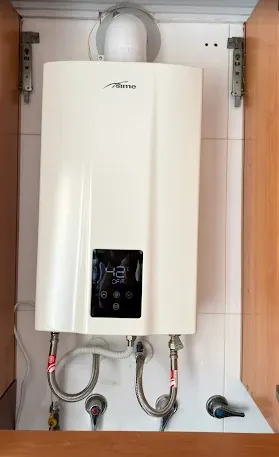 Calentador termostático con conexiones de agua nuevas
